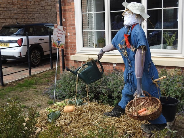 This Navenby householder even added some produce for their gardener scarecrow.