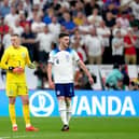 England's John Stones, goalkeeper Jordan Pickford and Declan Rice during the FIFA World Cup Quarter-Final match at the Al Bayt Stadium in Al Khor, Qatar. Picture: Nick Potts/PA Wire.