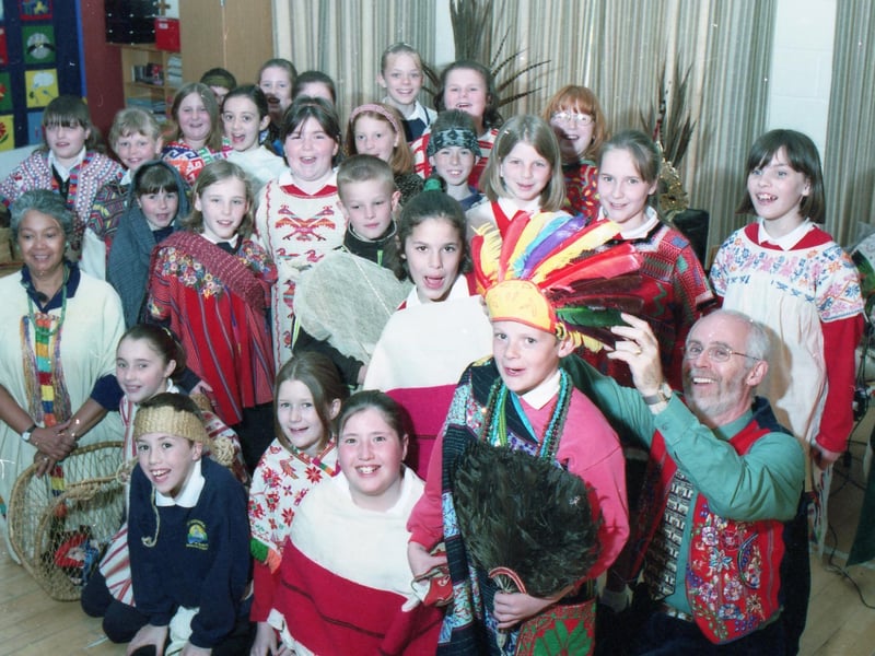Pupils at Swineshead Primary School during an Aztec workshop. They are pictured with Ian Mersell and Graciella Sanchez of Mexicouloro, who dressed the children in traditional Aztec outfits.