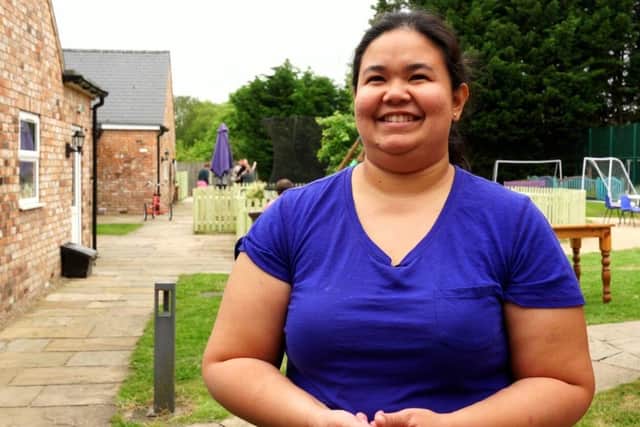 Shekinah, another member of the team recruited from the Philippines.