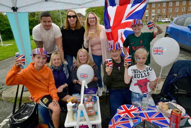Enjoying Grimoldby and Manby's coronation fun day, from left: Freddie Limb 10, Michael Limb, Michelle Spencer, Chloe Limb, Rachel Robinson, Emma Thomas, Tom Spencer, Max Robinson, 12, Ivy Robinson, 9.