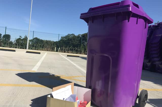The remaining three districts could be on stream with purple recycling bins for paper and card by 2025.