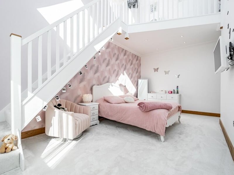 The two-storey 'mezzanine' bedroom.
