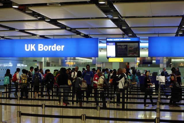 General view of passengers going through UK Border at Terminal 2 of Heathrow Airport.