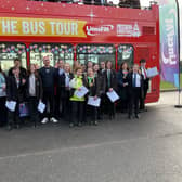 Stidents supporting the Lincs FM Mission Chrstmas appeal by filling a double decker bus with gifts  for children in need.