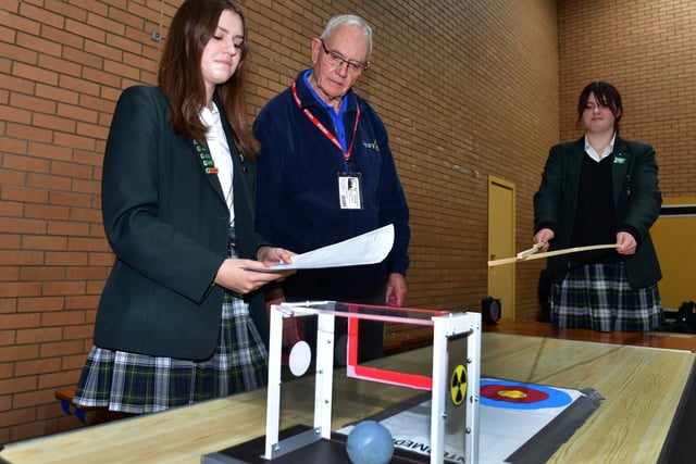 from left - Jannine and Scarlett from KSHS demonstrate their design to Bill Martindale of Sleaford & Kesteven Rotary Club. Photo: Mick Fox