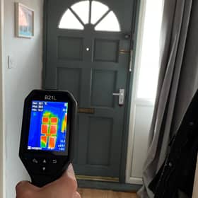 Thermal imagery showing heat loss around a door