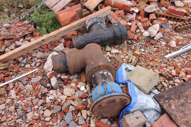 Mary hopes to salvage a few pieces of old water pipe as garden features.