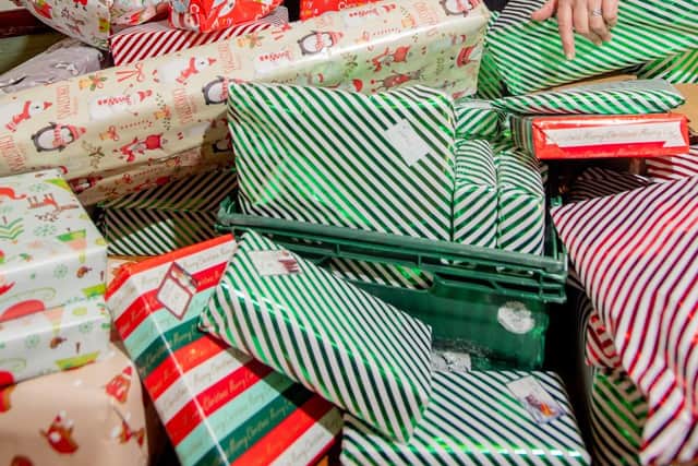 Rachael Bilcliffe, Rebecca Harris and Karen Holland wrapping presents in Horncastle.Photos: John Aron Photography