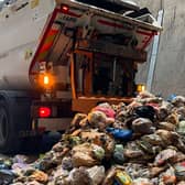 Food waste being emptied out of one of the new collection trucks at the council waste transfer station. Photo: LCC