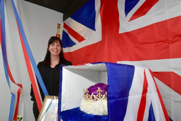 Manager of Clarks, Louth, Rachael Wood, with their patriotic shop window display. Photo: