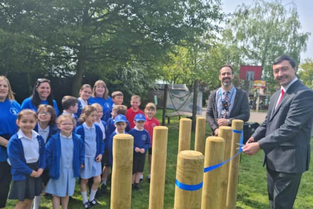 Coun Jimmy Brookes opens the trim trail at Burgh le Marsh school.