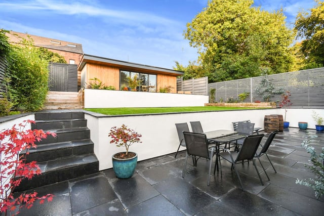 The garden room overlooks a patio area which looks ideal for entertaining.