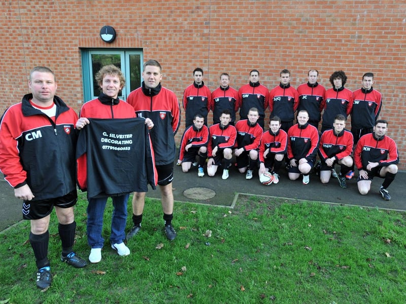 Louth Old Boys players, at the end of December 2012, sporting new tracksuits sponsored by G Silvester Decorating. Carl Munby, joint manager, is pictured thanking Graham Silvester, with Jordan Mackin, fellow joint manager.