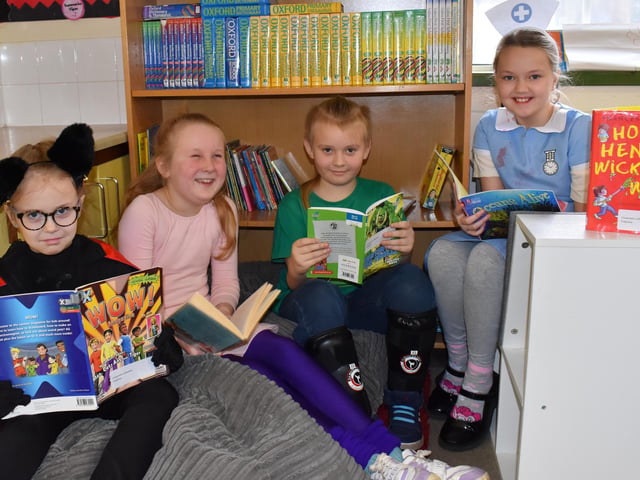 Children dressed as colourful characters for World Book Day.