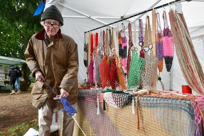 John Cook of Saltfleet demonstrating braiding, which is hand net making.