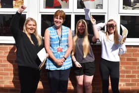 Sally Wharff, Haven High Academy's senior deputy headteacher, with pupils on GCSE results day.