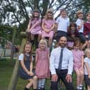 Head teacher Andrew Cook with just some of his pupils at Kelsey Primary School. Image: Dianne Tuckett