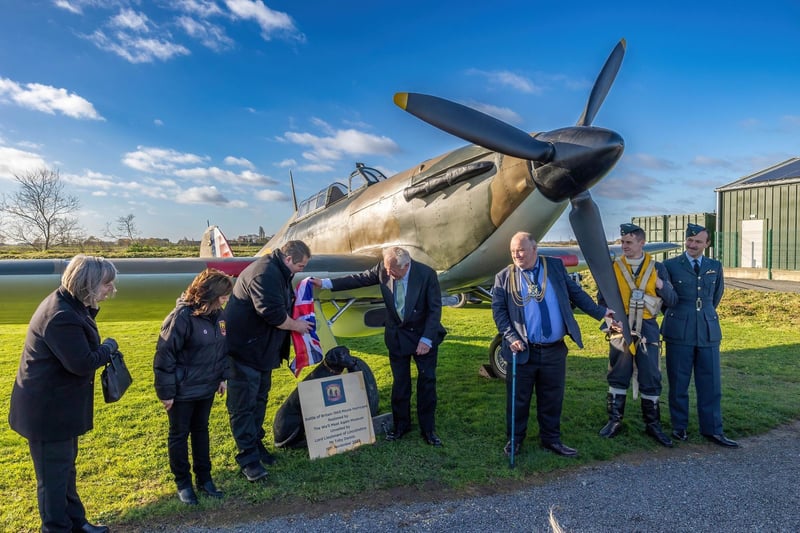 The Lord Lieutenant of Lincolnshire, Toby Dennis, officially unveils the Hurricane replica at the We'll Meet Again WWII Museum, near Boston, pictured alongside Paul and Linda Britchford, left, and Boston's Mayor, Coun David Brown. Photo by Jason Dawson.