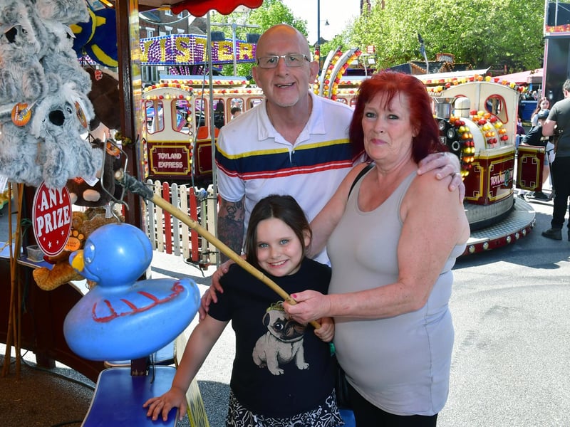 Martin and Diane Sharpe with Lily Hamilton, seven, of Boston.
