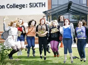 Jumping for joy - Boston College students celebrate getting their results outside the new sixth form block.