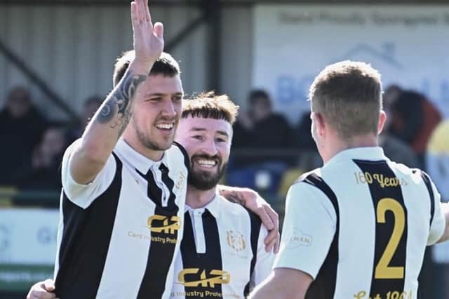 Hat-trick scorers Josh Batty (left) and Dayle Hutson celebrate one of Brigg's goals. Photo: Anna Bäckström.