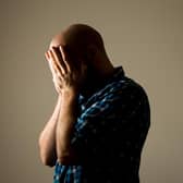 PICTURE POSED BY A MODEL File photo dated 09/03/2015 of man showing signs of depression. The UK is at risk of becoming a "burnt-out nation", a charity has warned, with a "worrying" number of people taking time off work due to poor mental health caused by stress. Mental Health UK has called on the Government to intervene and better support the workforce. It comes after a survey revealed more than a third of adults faced extreme pressure in the workplace in the past year. Issue date: Monday January 22, 2024.