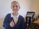 Little Trooper - aspiring young actress Isobel Johnson receives a medal from a military children’s charity.