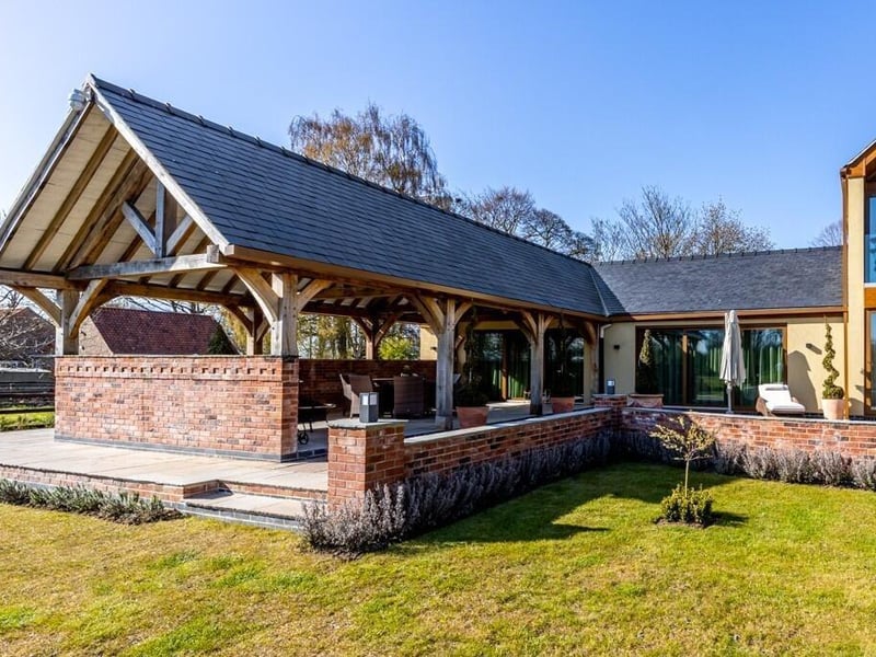 The outdoor kitchen and dining area.