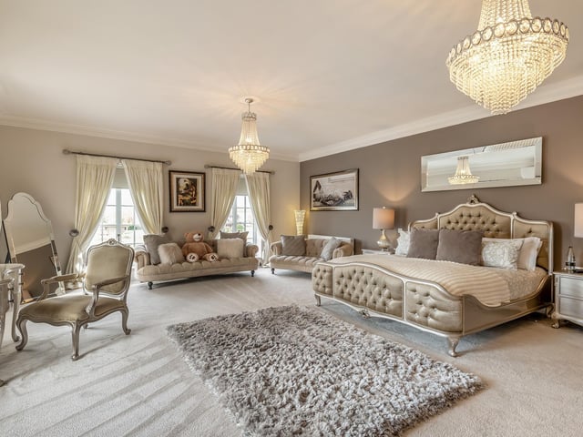 The principal bedroom and ...