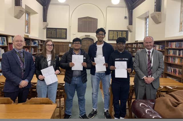 Pictured at Boston Grammar School John Lyon, head of sixth form, Jessica Burns, Aaron Thomas, Siddharth Anand, Kishore Murugesh, and John McHenry, headteacher.