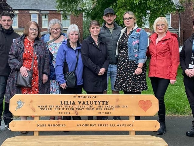 The presentation of the bench, with (from left): Sean Falkinder, Darren's son; Kathy Rushton and Heather Woodlock, friends of the Munnelly family; Karen Munnelly, Darren's mother; Cheryl Hollingsworth, Darren's sister; Lilia's stepdad Aurelijus Savickas; Lilia's mum Lina Savicke; Hilary Duberley, fund co-ordinator; Sarita Barton, of Boston Boston Council.
