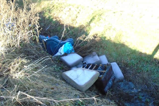 The waste dumped in the ditch on The Drove. Photo: NKDC