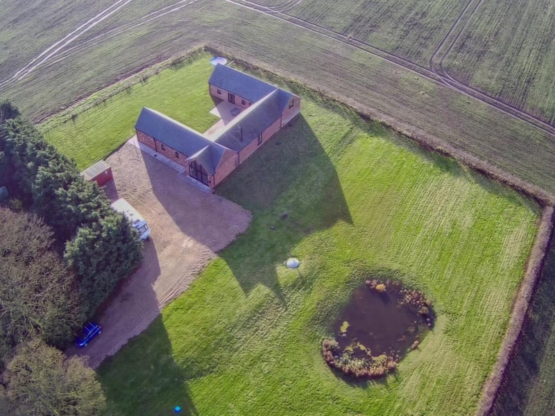 An aerial view of the property and its grounds.