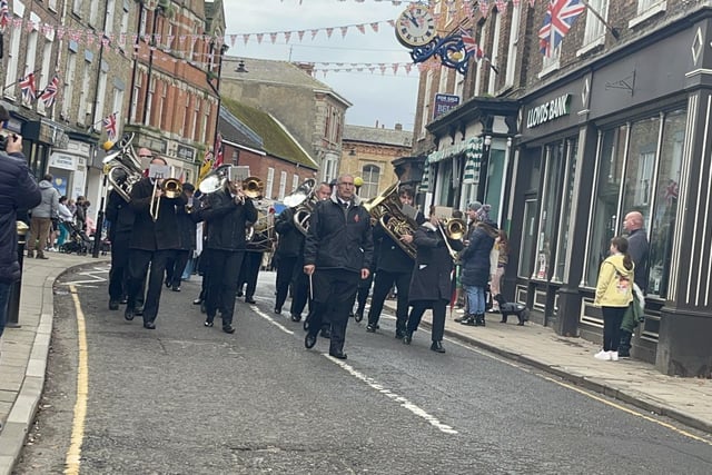 Banovallum Brass leads the parade down the high street.