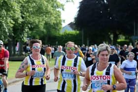 Emma (far left) on route to a PB