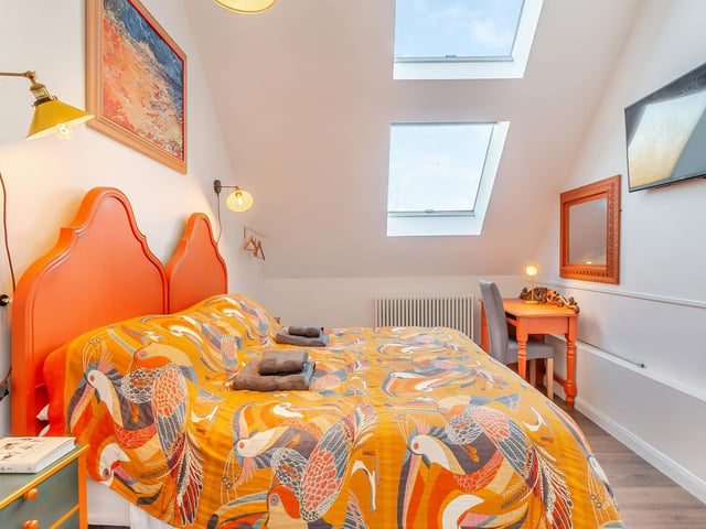 One of the artistically decorated bedrooms. Photo: Hope & Glory