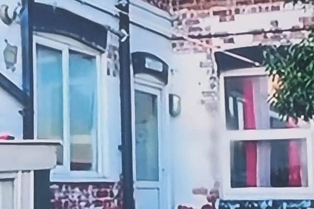 Flowers by the door of the flat where Bronson and his father, Kenneth, lived.
