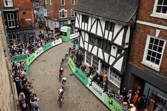 Riders take part in the first stage of the Tour of Britain cycle race in Lincoln, eastern England on September 2, 2026. (Photo by Oli SCARFF / AFP via Getty Images)
