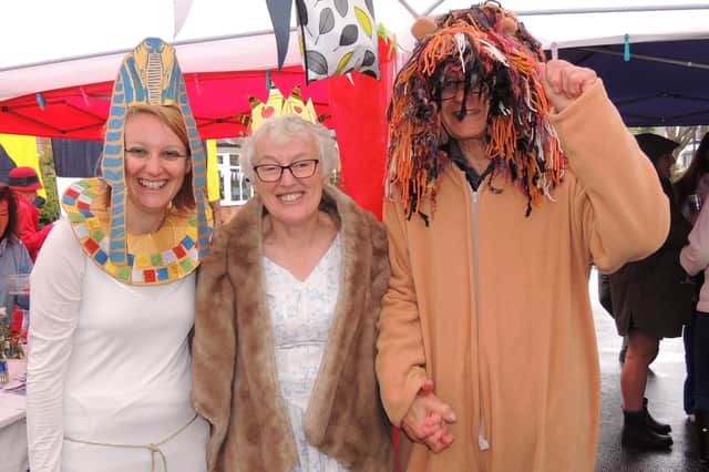 Fancy dress for the street party in Victoria Avenue in Sleaford on a rainy Sunday. From left - Sarah Walker, Rosie and John Parry.