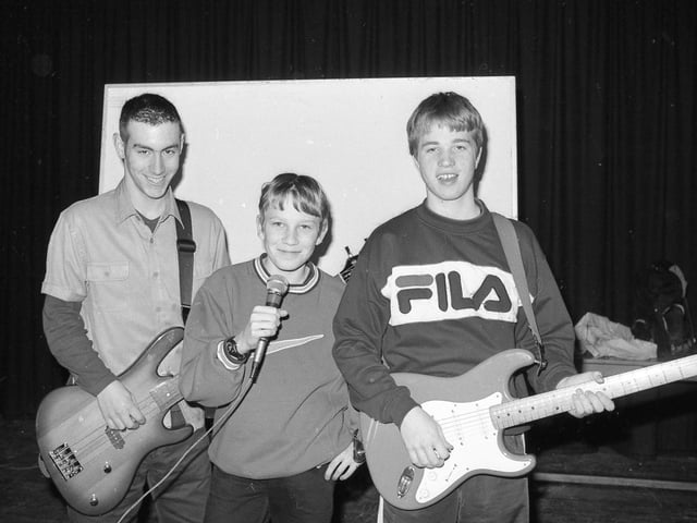 Busking for donations Tom Gosling, Tom Adams and Darren Reynolds.