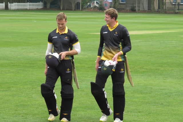 Ben Wright and Jordan Cook leaving the field at the end of Lincolnshire's first innings in the second game against Cambridgeshire at Woodhall Spa CC on Sunday.