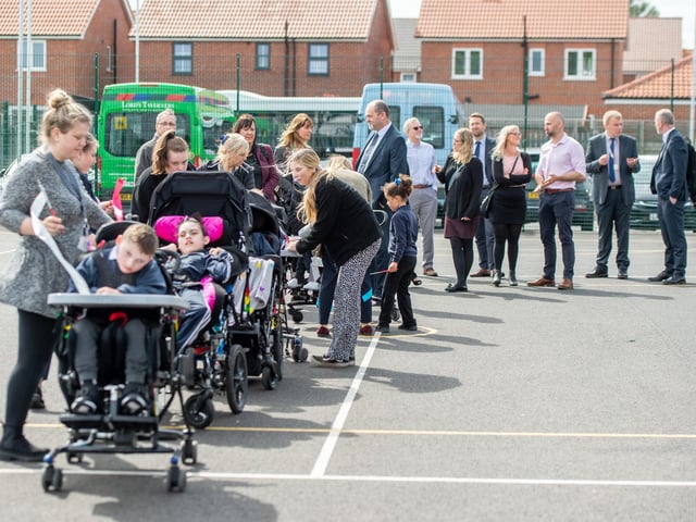 Pupils enjoy a tour around the new outside play areas.