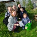 Phoebe Parrinder, 5, with Sarah Cash, Jayne Cash, Nicola Cash, Adam Parrinder, Amanda Cash of Louth.