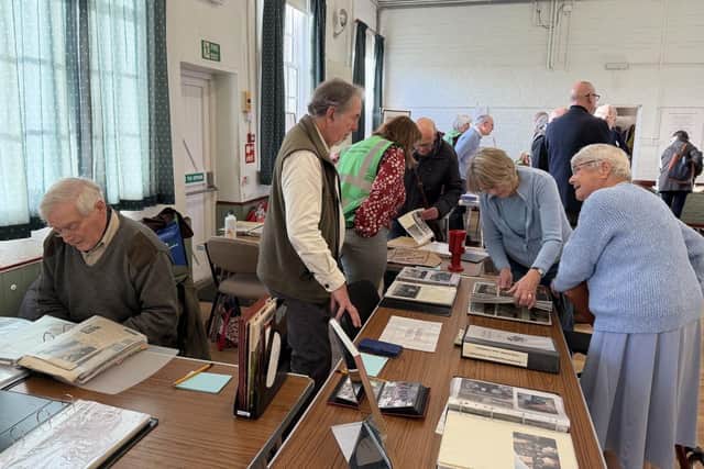 Pearl Wheatley deep in conversation at the Horncastle History and Heritage Society's 60th birthday event with society member Mike Martin.