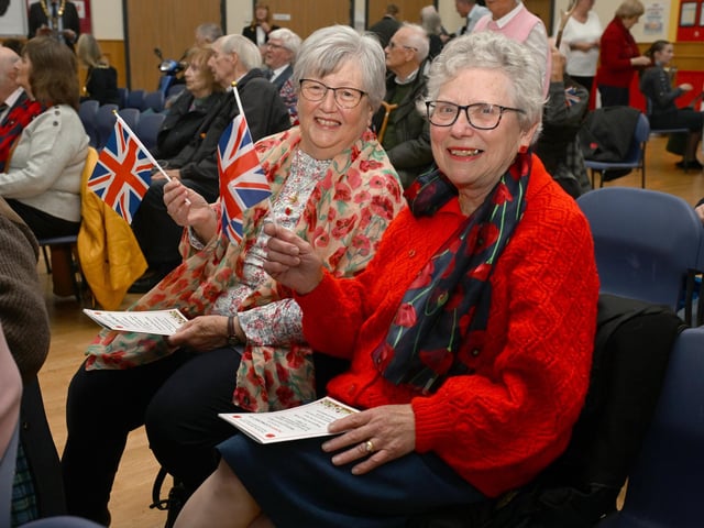 Patriotic flag waving was necessary. From left - Jean Stewart of Heckington and Jean Addison of Helpringham. Photo: David Dawson