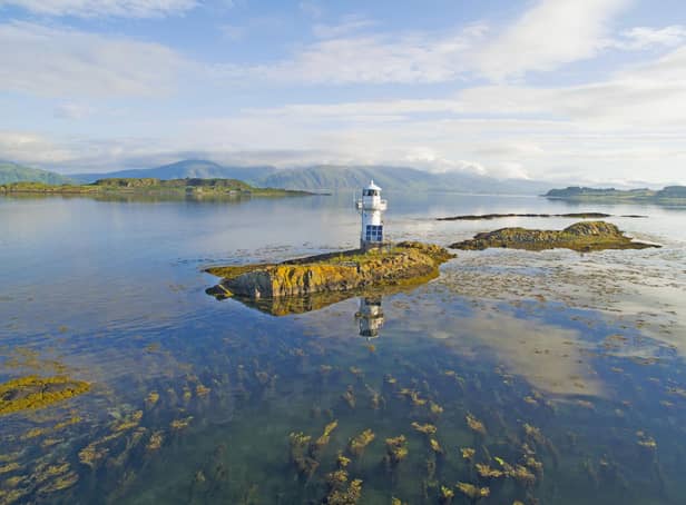 The view across Loch Linnhe to the Morvern Mountains with the Sgeir Bhuidhe Lighthouse in the foreground