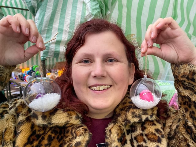 Michelle Molesworth with a pair of baubles.
