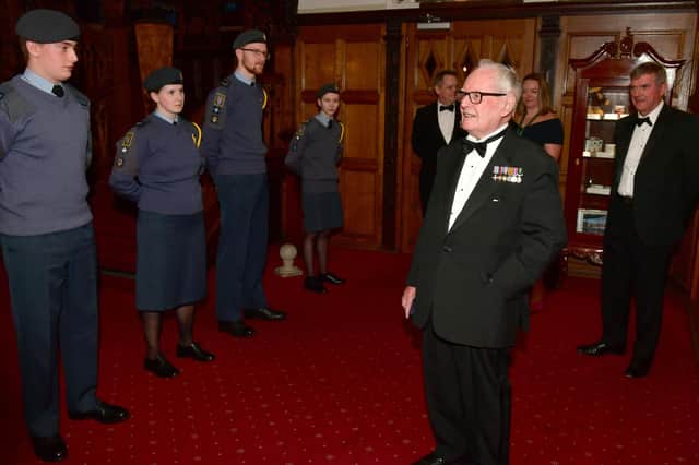 Cadets from the RAF section at King Edward VI Grammar School, Louth, providing a guard of honour for Flt Lt (Retd) Colin Bell DFC, a former Mosquito Pathfinder pilot.
