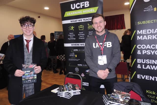 Student Daniel O'Halloran with Jordan Hearne, regional recruitment manager for the University Campus of Football Business.